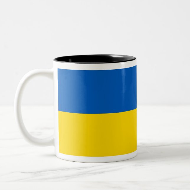 STAND WITH UKRAINE! Two-Tone COFFEE MUG (Left)