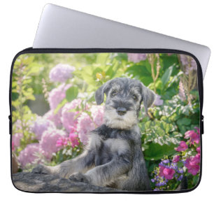 Standard Schnauzer Puppy in a Flowering Garden - Laptop Sleeve