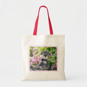 Standard Schnauzer Puppy in a Flowering Garden - Tote Bag