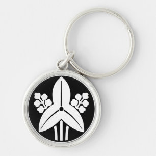 Standing arrowhead in rice cake key ring