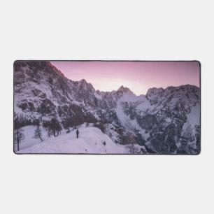 Standing in winter wonderland desk mat