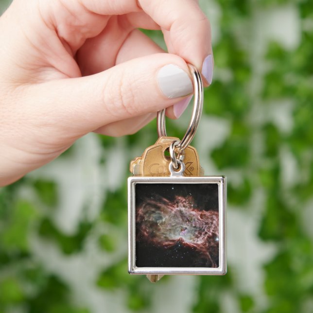 Star Clusters In The Centre Of The Flame Nebula. Key Ring (Hand)