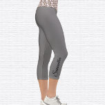 Star Lights Om Symbol High Waisted Capri Leggings<br><div class="desc">Star lights pattern Om symbol is tiled on the waistband, the capri leggings are gray. Name in black on outside of right calf. Easily change or remove name using the Template provided. There is ample room for a full name or other text. Sizes from XS (0-2) to XL (16) I...</div>