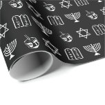 Star of David Dreidel Menorah Torah black Hanukkah Wrapping Paper<br><div class="desc">Star of David,  Hebrew Magen David,  Dreidel,  menorah,  Torah black and white pattern gift wrapping paper.
White graphic pattern on black background colour.
Minimalist,  modern,  simple,  elegant design.

This wrapping paper is great for Hanukkah,  Chanukah,  bar mitzvah,  bat mitzvah,  Shabbat and Jewish Holidays.</div>