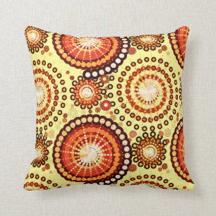 Starbursts and pinwheels, brown and yellow cushion