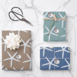 Starfish and Ornament Beach Christmas Wrapping Paper Sheet<br><div class="desc">Starfish and ornament pattern Christmas wrapping paper sheets.  Sand brown,  sea blue,  and pale teal green sheets have a pattern of white sea stars and a silver white ornament.  Perfect for gift giving in a warm climate.</div>