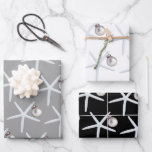 Starfish and Ornament Beach Christmas Wrapping Paper Sheet<br><div class="desc">Starfish and ornament pattern Christmas wrapping paper sheets.  Neutral black,  white and grey sheets have a pattern of white sea stars with a silver white ornament.  Perfect for gift giving in a warm climate.</div>