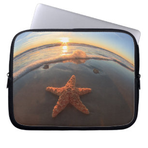 Starfish on Beach at Sunset Laptop Sleeve