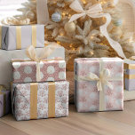 Starfish Sand Dollar Rose Gold Pink Christmas Wrapping Paper Sheet<br><div class="desc">This set of 3 wrapping paper sheets is perfect for coastal holiday gift wrapping. The Christmas beach themed patterns include: sand dollar and starfish with rose gold glitter coral on pink background; white sand dollars on rose gold glitter background; rose gold glitter coral on a white background. *If you would...</div>