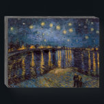 Starry Night Over Rhone River by Vincent Van Gogh Wooden Box Sign<br><div class="desc">Dreamlike story inspired by Vincent Van Gogh's Night Over the Rhône: The air hummed with the low thrum of the river, a lullaby that lulled the senses. Two figures, their faces obscured by the soft glow of the gas lamps, strolled along the riverbank. They moved with a gentle sway, as...</div>