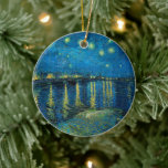 Starry Night Over the Rhône | Vincent van Gogh Ceramic Ornament<br><div class="desc">Starry Night Over the Rhône (1888) by Vincent van Gogh is a mesmerising Post-Impressionist painting that captures a serene nighttime view of the Rhône River in Arles, France. The artwork features a deep blue sky adorned with shimmering golden stars and their reflections on the water. In the foreground, two figures...</div>