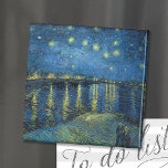 Starry Night Over the Rhône | Vincent van Gogh Magnet<br><div class="desc">Starry Night Over the Rhône (1888) by Vincent van Gogh is a mesmerizing Post-Impressionist painting that captures a serene nighttime view of the Rhône River in Arles, France. The artwork features a deep blue sky adorned with shimmering golden stars and their reflections on the water. In the foreground, two figures...</div>