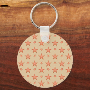 Starry pattern in gradient terracotta orange key ring