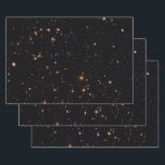 Starry universe deep space photo wrapping paper sheet<br><div class="desc">Universe or cosmos space image from a photo of deep space galaxies taken from the Hubble telescope. Surprise your favourite science geek or astronomer.</div>