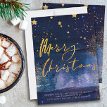 Starry Winter Night Merry Christmas Blue Gold Holi Holiday Card<br><div class="desc">Starry winter night Merry Christmas holiday card with elegant gold script calligraphy. This chic and modern design combines blue watercolor brush strokes, gold stars, starlight glow, gold dust and a misty forest. It is hand lettered with Merry Christmas and the template is set up for you to add your personalised...</div>