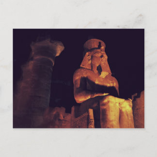 Statue of king in Luxor Temple in Egypt by night Postcard