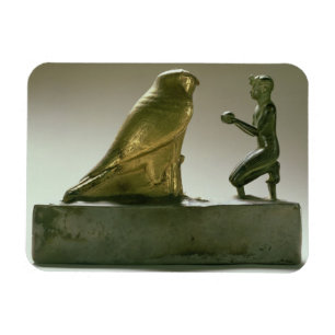 Statue of King Taharqa worshipping the falcon-god Magnet