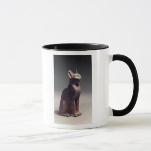 Statuette of a cat with gold earrings mug