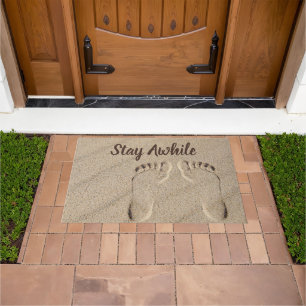 Stay Awhile Footprints In Sand Doormat
