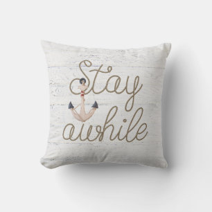 stay awhile rope on whitewashed wood cushion