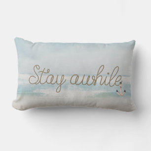 Stay Awhile rope text with anchor on ocean Lumbar Cushion