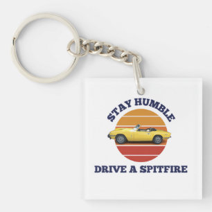 Stay humble, drive a triumph spitfire key ring