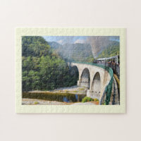 Steam train on a bridge