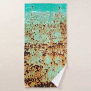 steel surface. An old weathered Green Bath Towel