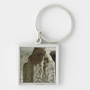 Stele with the text of a sacred law key ring