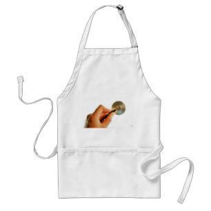 Stethoscope in a hand for a hospital atmosphere. standard apron
