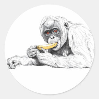 Sticker with the image of a monkey with a banana