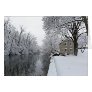 Still House along still water in snow