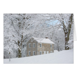 Still House behind snowy bank