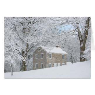 Still House behind snowy bank