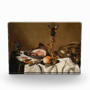Still life with ham, books and ornamental vessels  photo block