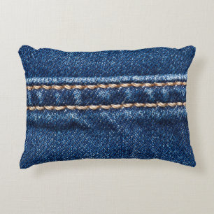 Stitched denim: closeup jeans texture. decorative cushion