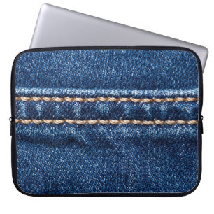 Stitched denim: closeup jeans texture. laptop sleeve