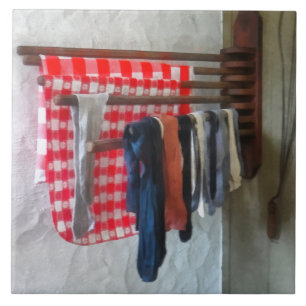 Stockings Hanging to Dry Ceramic Tile