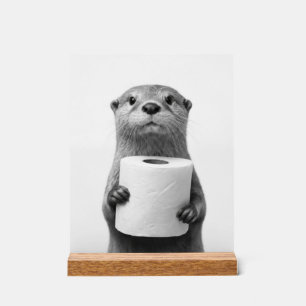 Stoic Otter Holding Toilet Paper Roll Black White Acrylic Sign