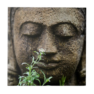 Stone garden statue with flower ceramic tile