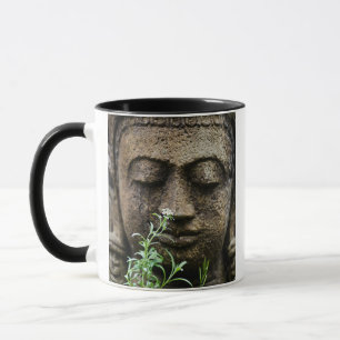 Stone garden statue with flower mug