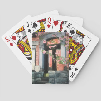 Stone porch with cherry blossom tree playing cards