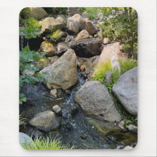 Stone river bed    waterfall   forest greenery  mouse pad