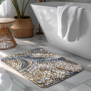 Stone Wall With Spiral Designs Made From Rocks Bath Mat