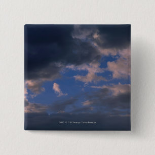 Storm clouds against blue sky 15 cm square badge