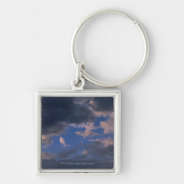 Storm clouds against blue sky key ring (Front)
