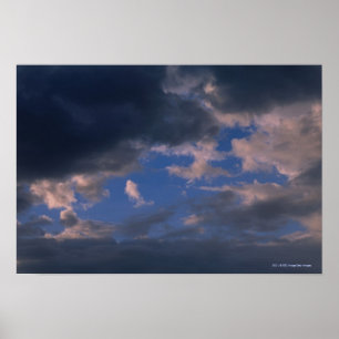 Storm clouds against blue sky poster