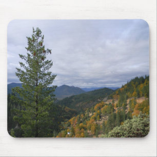 Stormy clouds with Fall colours over the mountains Mouse Pad