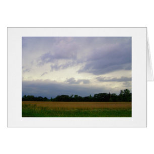 Stormy skies bad weather approaching farm fields
