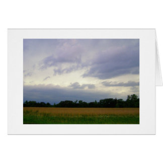 Stormy skies bad weather approaching farm fields